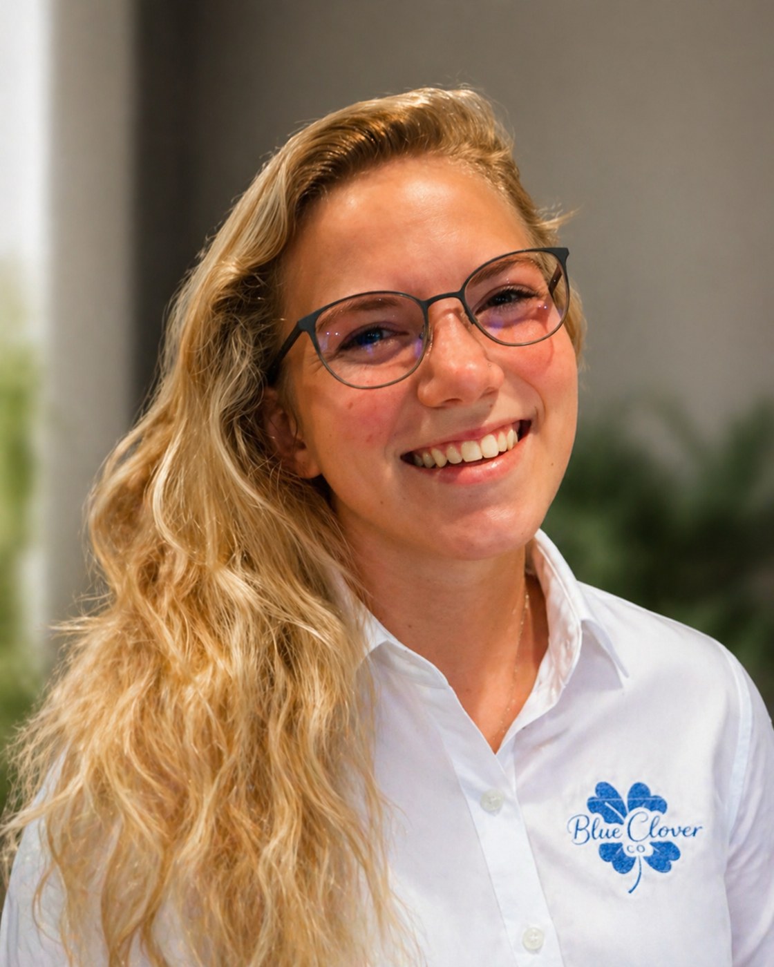Alycia wearing her Blue Clover embroidered polo