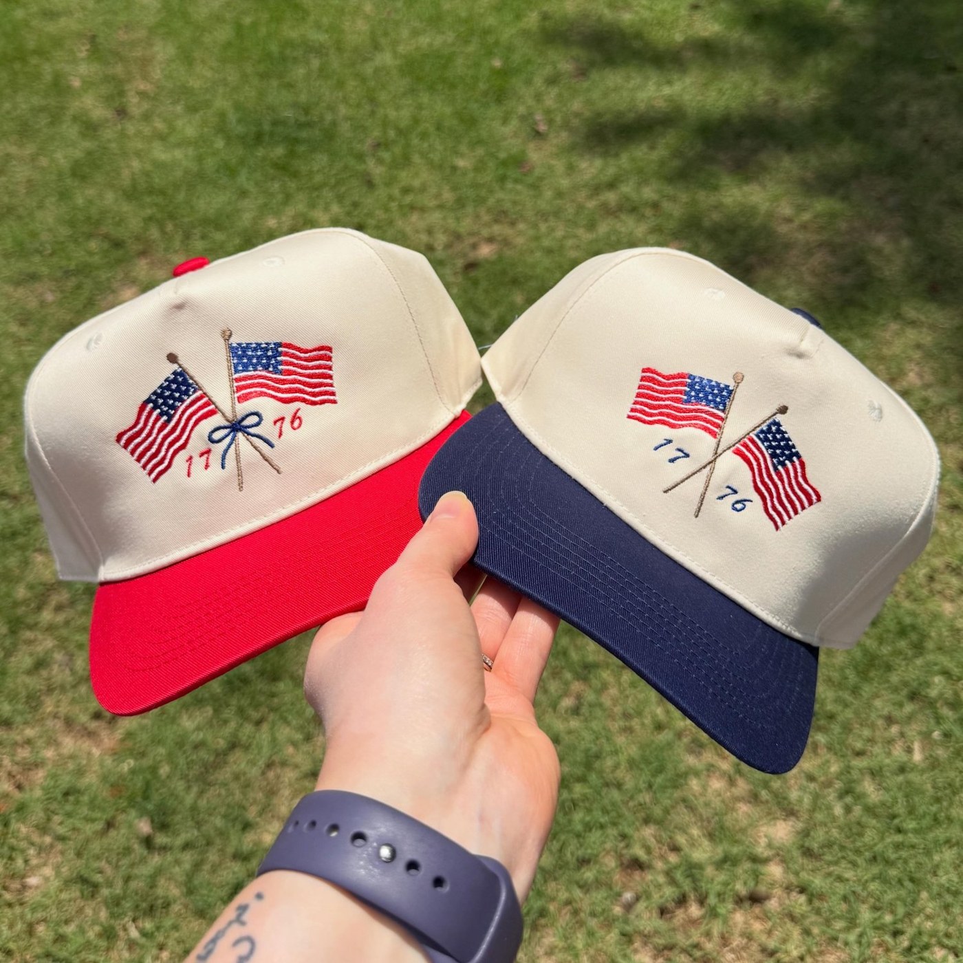Two embroidered Americana caps with red and blue bills