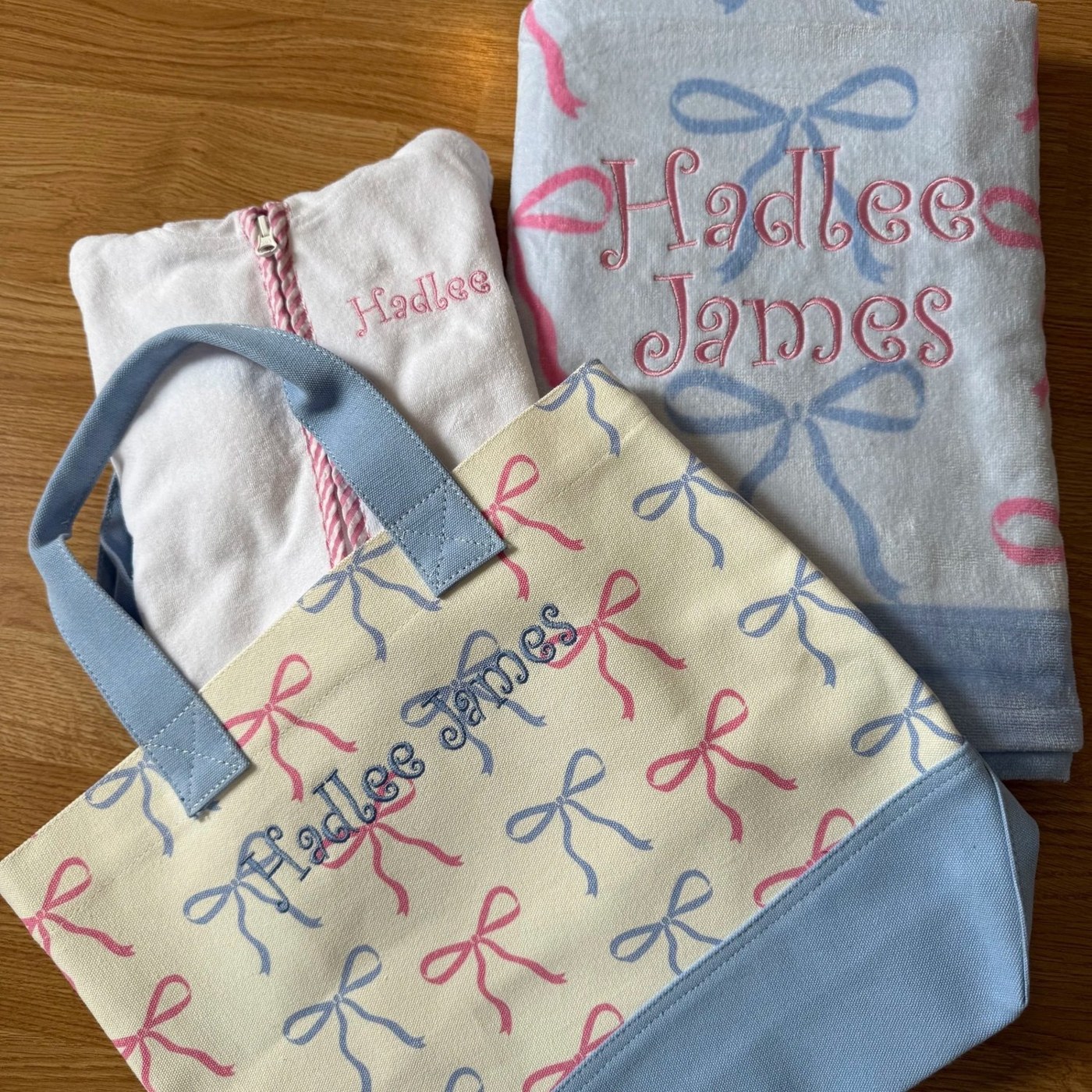 Personalized bow-print bag with coordinating embroidered garments